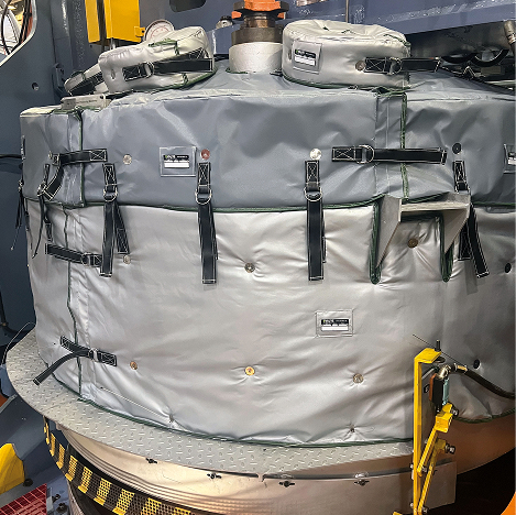 Removable reusable thermal blanket and jacket insulation installed on tire press