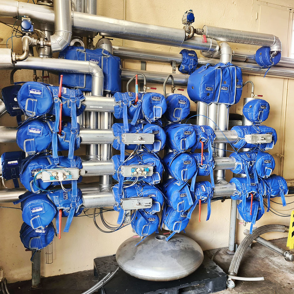 Removable reusable blanket insulation and jacket insulation on organic thermal fluid process system valves, pumps, and pipework