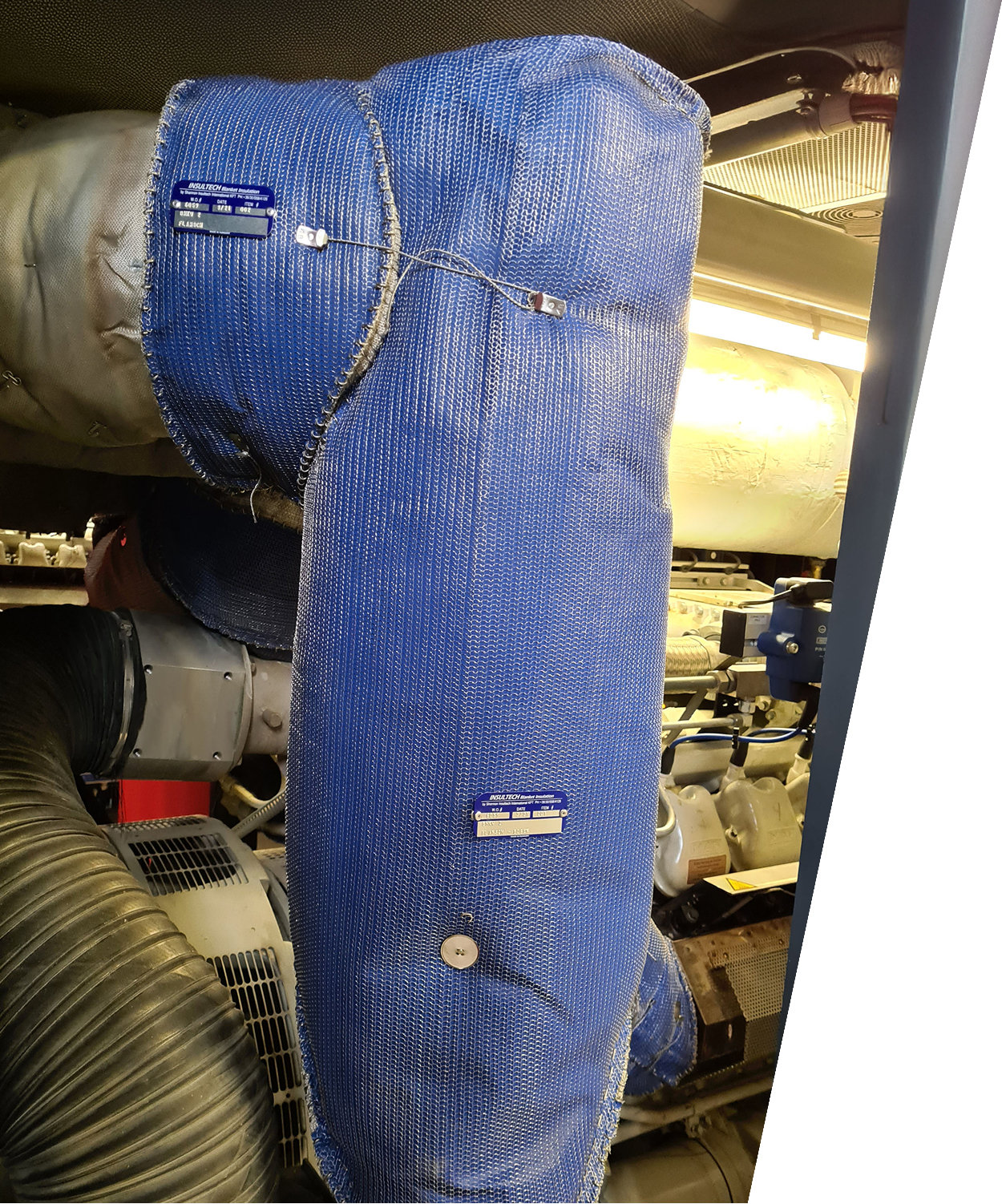 High temperature insulation blanket installed on industrial engine exhaust